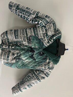 Jurassic Park Graphic Reversible Puffer Jacket in Teal and White